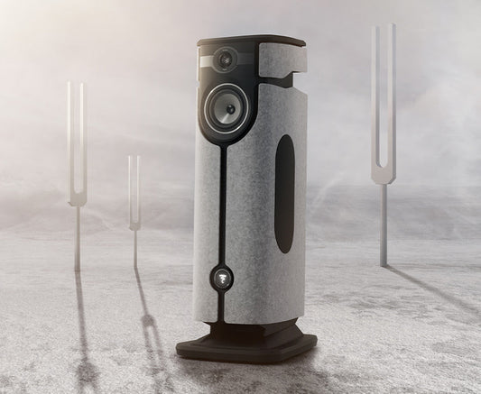 A Focal Diva sits in a desert ladnscape with tuning forks like cactii.